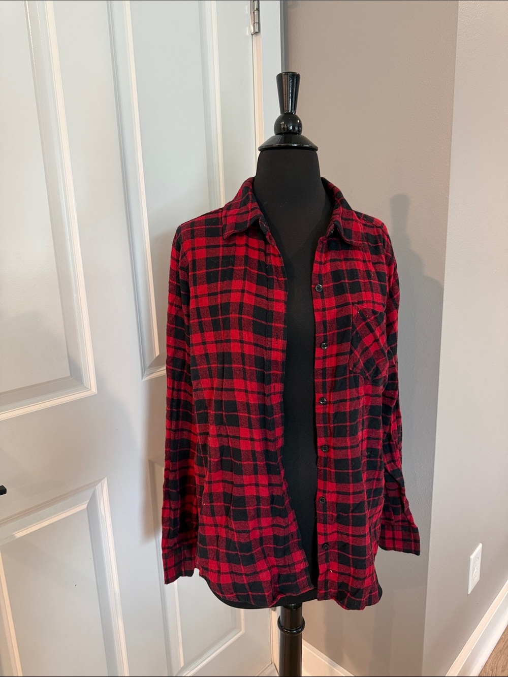 Woman’s black and red flannel